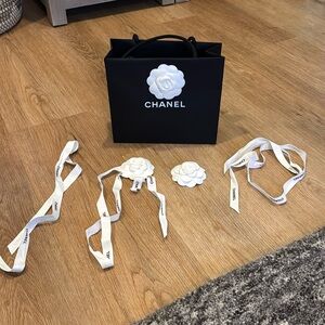 Chanel small bag with flowers and ribbons